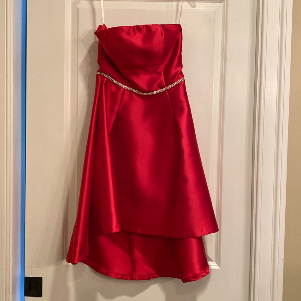 Tween dress size small.  Never worn